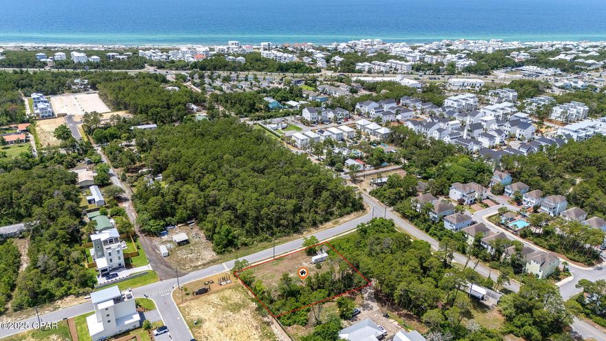 Discover a prime opportunity to build in one of the most sought-after areas of Inlet Beach! This spacious 0.5-acre lot has already been cleared and features a working well house, a power pole, and access to public utilities, making it ready for development. With ample space to construct a main residence, a carriage house, a pool, build a family or friends vacation compound and much more, this property offers exceptional flexibility for your vision.

One of the best values per square foot in the area. Located less than half a mile from the beach and just minutes from 30Avenue, and the new underpass tunnel connecting to Highway 30A's vibrant shops and neighborhoods, the property provides easy access to everything the Emerald Coast has to offer.

Enjoy the freedom of no HOA nor rental restrictions, and take full advantage of the area's lifestyle—bike or take your golf cart to the beach, explore nearby Camp Helen State Park, or launch your boat from Lake Powell. Flood Zone X means flood insurance is not required. This is your chance to own a versatile piece of paradise in the heart of Inlet Beach.