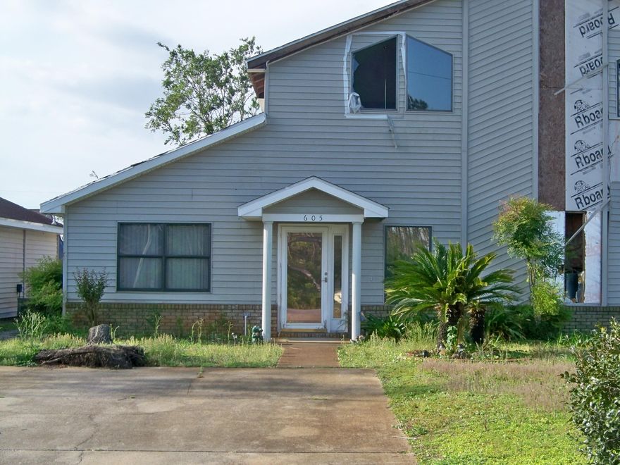 Severe hurricane damage.  Investor special. Bring all offers. Do Not Enter Property. All measurements approx. Buyer to verify.