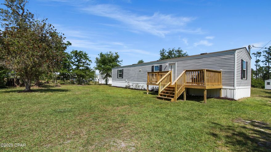 CURRENTLY UNDER CONTRACT, SELLER WILL CONSIDER BACKUP OFFERS-Situated on a half-acre parcel, this 4 year old, well maintained  2-bedroom, 2-bath mobile home is ready to welcome you. From the moment you arrive, a brand-new front deck invites you to unwind with a morning coffee or evening sunset—there's plenty of room for chairs and a small table or grill. Step inside to find durable vinyl-plank flooring flowing throughout the open living area—easy to maintain and stylish. The kitchen is spacious and leads to the indoor laundry room and also has a convenient breakfast bar that's perfect for casual meals or entertaining guests. With NO HOA, you can store your boat, RV, or add a pole barn. A 12 x 12  storage shed is already in place with a Red Snapper riding mower included in the sale. Ideal for a primary, second, or investment property. 
Projected long-term rental income is around $1,500/month. Call your favorite agent for a showing today!