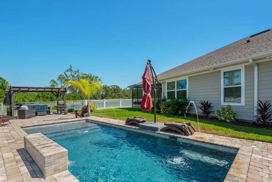 CURRENTLY UNDER CONTRACT, SELLER ACCEPTING BACKUP OFFERS. Could it be possible that THIS is the home of your dreams? Imagine the two of you waking up to a gorgeous view of the pond and woods, with no neighbors behind you...the kids on the far OTHER SIDE of the house in their two rooms. Get ready for the day in the massive master bathroom that features his and her sinks, a ''super-shower'' and walk-in closet. Make coffee and enjoy breakfast in the large, open kitchen that is loaded with upgrades. The guest bedroom (fourth bedroom) is separated from the other two kids' rooms near the front of the house with its own bathroom, just off of the office next to the formal dining room. Once you get home from work and are ready for the weekend, enjoy an outdoor space like no other. Play in the huge pool with its own waterfall feature or do a little grilling at the outdoor kitchen...all while overlooking the beautiful woods with no neighbor next to you. Just one more thing...there is a screened in patio as well. Loaded with tech upgrades, construction updates and more, this one is a true must see. Before making up your mind about one of the biggest decisions, be sure and see this home.