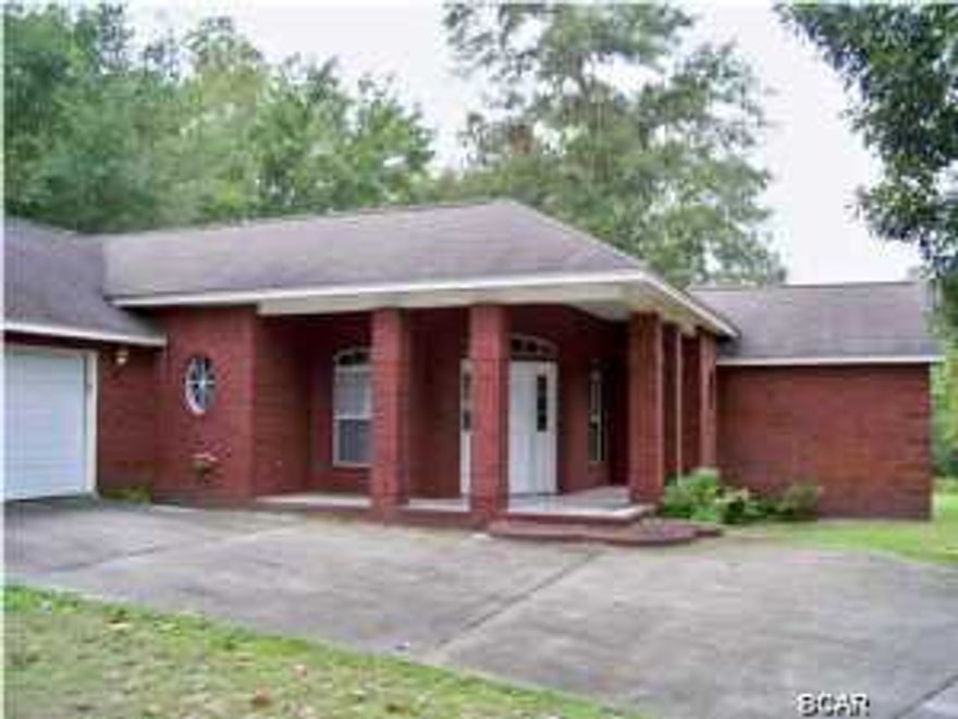 You will want to see this charming all brick home located on a canal that flows into Deerpoint Lake. The fishing is great!! This All brick home with two car garage, architectural appointments inside includes french doors, tile, 10 foot ceilings, kitchen island, large master with plenty of closet space, huge bathroom with walk-in shower and separate bath. An outside deck overlooks the beautiful wooded lot down to the water, approx. 90' of waterfront. Perfect space for a quiet retreat - call for an appointment today! This is a Fannie Mae HomePath Property. All measurements taken from property appraiser information. Please verify if important.
