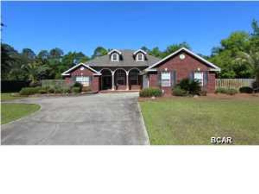 Just Reduced! Are you looking for upscale living close to town with lots of space - then this upgraded home with in-ground pool and 24 x 24 shop on 1.3 acres is for you. Quality and attention to detail set this home apart from the others on the market and is evident from the moment that you approach the home and view the meticulously landscaped grounds to the grand foyer with Brazilian cherry wood floors, 11 ft ceilings and atrium window over the beautiful door with transoms. Just off the entry is an arched doorway leading into the formal dining room that showcases the elaborate crown moldings, window casings & baseboards, there are also double atrium windows, wainscoting, Brazilian Wood Cherry Floors and 11 ft ceilings which continue into the living room as do the wood floors. There