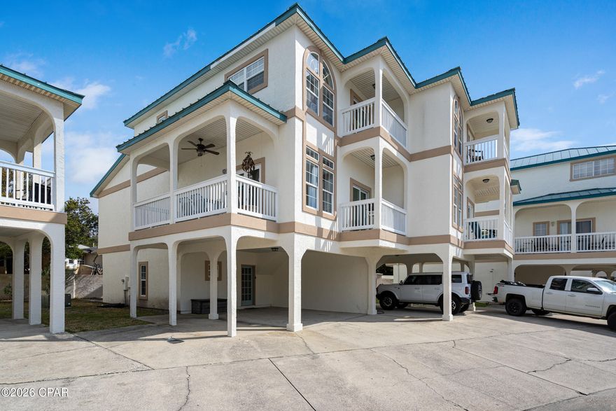 Beachfront Bliss in Panama City Beach. Welcome to 17878 Front Beach Road, Unit E2, your perfect slice of paradise, offering a short 3-minute walk to toes-in-the-sand! With $25,000 already on the books for 2026, it's sure to be a great income-producing property to add to the portfolio. Recently refreshed with a stylishly painted exterior, this townhome radiates curb appeal and sets the tone for relaxed beach living. Step inside to discover a bright and airy open floor plan, ideal for hosting friends and family after a day by the water. The main level features a fully equipped kitchen, a spacious living area, and sliding glass doors that lead to a private patio, where you can enjoy breathtaking sunsets over the Gulf.