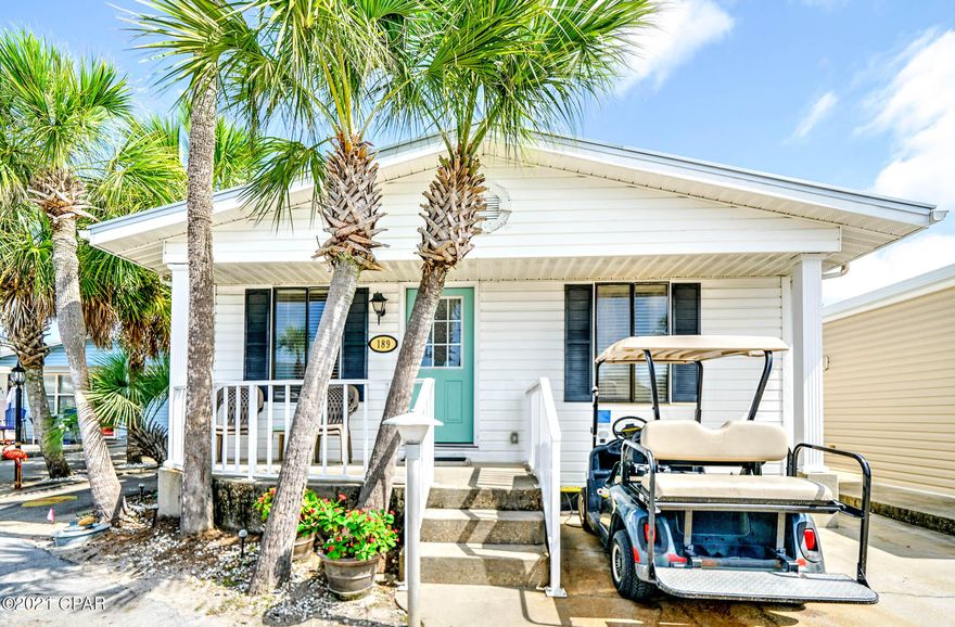 The wait is over, you found your new beach house! Check out this darling 3 bedroom 2 bath Venture Out home.  This stunning home has large rooms and flows beautifully.  The location is fantastic within the resort.    Great potential here for investment or 2nd home!  Venture Out is a golf cart community that has exploded with popularity recently... With 300' on the beautiful pristine beaches of the Gulf of Mexico and 1,000' on the Grand Lagoon. Venture Out has something for everyone. With 2 pools, fishing pier, boat ramp, mini golf, children's play ground and much much more!