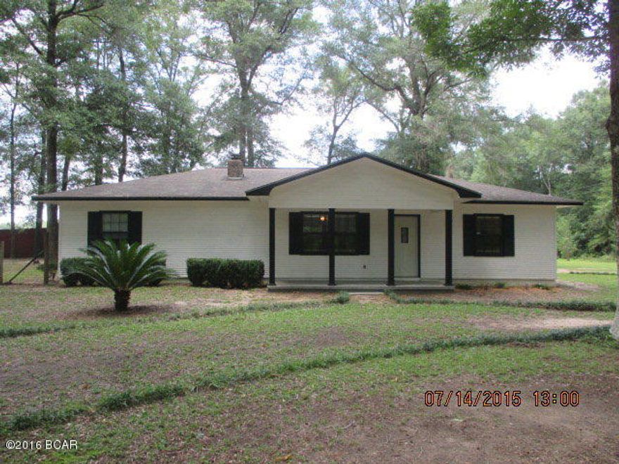 If you are looking for peace and quiet not too far from town, this home is for you! This is a spacious 3 bedroom 2 bath house with a split floor plan on 1.5 acres. Features include a huge master bath, bonus room for an office or exercise equipment, large living room with a wood burning fireplace opened to a long breakfast bar. Low utilities bills are not uncommon with this house due to its gas stove and hot water heater and new a/c unit. Home has had some damage, but could qualify for a renovation construction loan. This is a must see! Call for an appointment today.