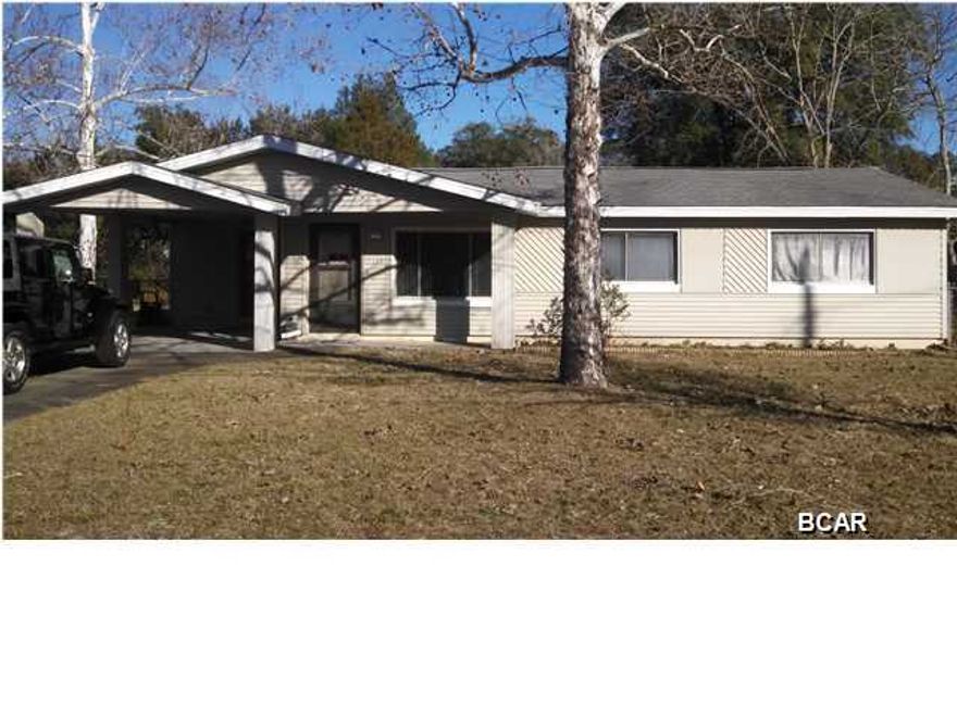 Excellent Opportunity for a solid first home or investor rental opportunity with a little TLC. Aluminum siding over concrete block construction.  Large entry/laundry room, bonus room/work room or office. Exterior in good condition on big lot with 20 X 14 workshop on pad with power and a/c. Priced for quick sale.