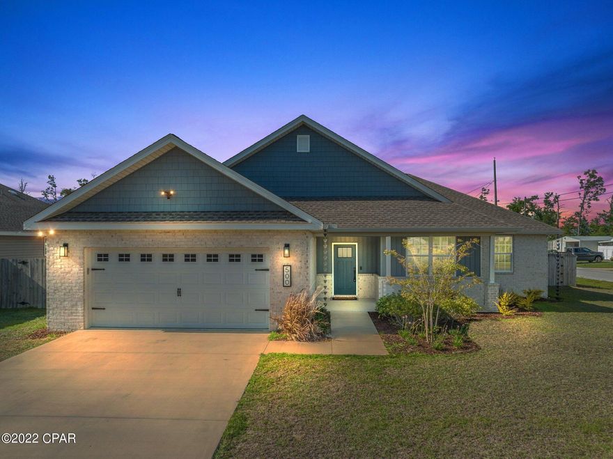 CURRENTLY UNDER CONTRACT, SELLER ACCEPTING BACKUP OFFERS. Incredible recently built home with lots of upgrades to love! Sellers have upgraded all the builder-grade finishes in this 2 year-old home to create a truly custom, move-in ready home for your family to love. Nestled on a corner lot in the heart of Lynn Haven, this house is conveniently located to coffee shops, grocery stores, and restaurants. Step inside this 4 bedroom, 2 bathroom home to see an updated open kitchen and living room with plenty of space to entertain. This smart home is fully connected with security cameras, wifi sprinklers, wifi garage door, and wifi front flood lights and porch lights. Upgrades: new fence, gutters with rain chains, soft close cabinets, door handles, lights, fans, flooring, and more!