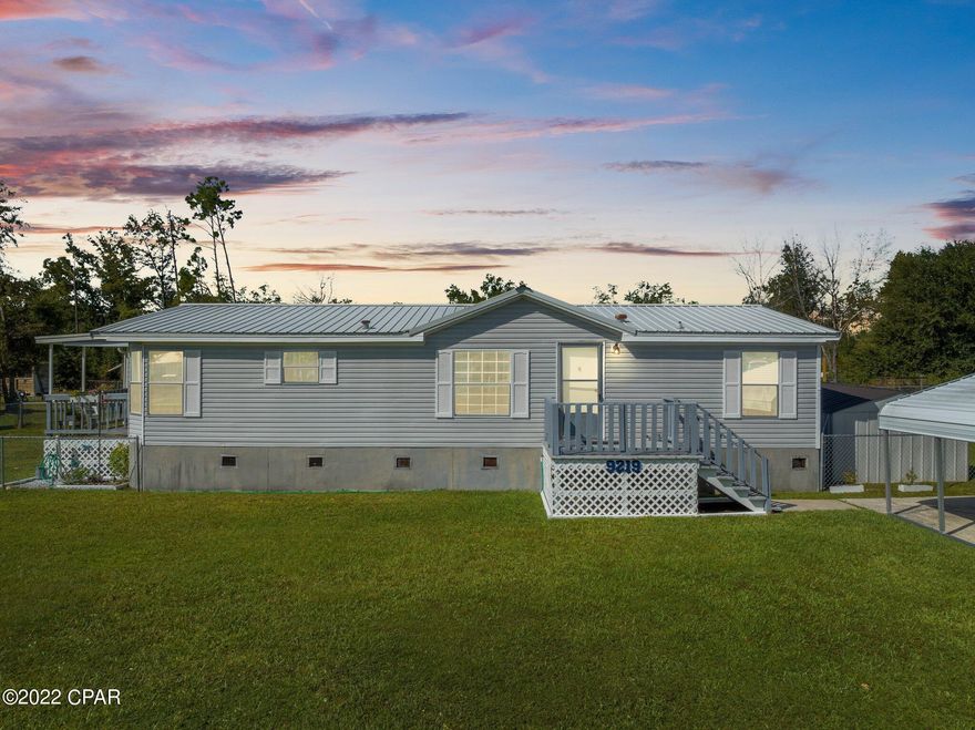 This newly renovated 3-bedroom, 2-bathroom double wide is in a quiet, rural setting. Throughout this home you will find all new flooring, paint, trim, vanities, toilets, countertops, and cabinets. This home also features a new air conditioner, water heater, and metal roof. In the backyard there is a large, covered deck with plenty of room to Barbecue and entertain, along with a shed for extra storage. This home sits just minutes from North Bay and 30 minutes from Panama City Beach.