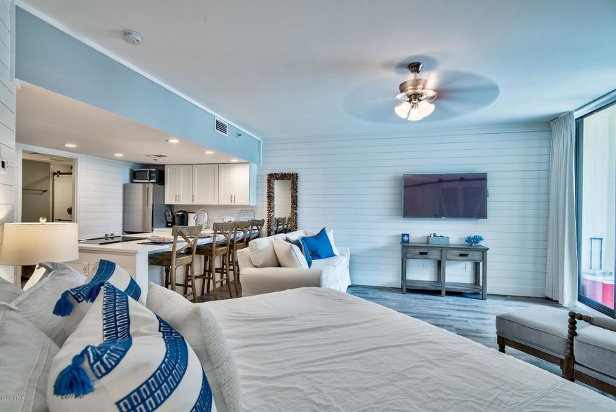 ONE of a kind, completely remodeled condo at East Pass Towers at the tip of Norriego Point on the Destin Harbor.  Appointed with light coastal accents and colors this property is sure to impress and offer a functional setting from the casual second home owner to the savvy vacation rental investor.  East Pass Tower 1 allows for short term rentals and offers a unique setting overlooking the Destin Pass from the oversized pool deck offering a large pool, hot tub and beach access area.  The condo has a full bathroom with standing shower, full kitchen, king bed, sitting area and full size laundry.  A large covered balcony offers plenty of room for relaxing and dining.  This is a perfect beach getaway and you can take the water taxi from the back of the complex to any location on the Harbor