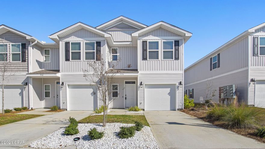 Check out this END UNIT! 3 bed, 2.5 bath townhome located minutes from Tyndall AFB and walking distance from shopping and restaurants! This community has a pool too! The home is spacious, modern and ready for you to move into! NEW fridge, washer and dryer, cabinets professionally painted a trendy gray. 1st floor painted with Satin paint instead of the standard flat paint. Behind this home is wetlands so it's a beautiful view and nothing is planned to be built back there. You are right by Starbucks, Dunkin, dining and so much more but it is so quiet and secluded! Stanley Steemer professionally cleaned carpets. HOA includes trash service, pool, irrigation and maintenence, lawn care and exterior insurance for the building. 
Master shower has a multi-function shower head, also updated shower head in second bathroom. Home is also a SMART home and comes with the ALEXA and DOT...Schedule a showing today.