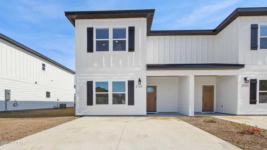Discover the essence of modern luxury living in this newly constructed townhome, ideally located near Highway 231 in Panama City, Florida. This highly desirable property allows short-term rentals, features no HOA, and offers convenient access to local dining, shopping, and is just 18 minutes from Tyndall Air Force Base. The thoughtfully designed main level showcases an open-concept layout that seamlessly connects the kitchen, dining, and living areas, perfect for both everyday living and entertaining. This level also includes a large bedroom, a full bathroom, and ample storage space. Step outside to the covered back porch, an inviting space to enjoy morning coffee or unwind with an evening glass of wine. The kitchen features a large center island, modern white shaker cabinetry, stainless steel appliances, quartz countertops, and sleek black fixtures and hardware. The whole home is finished with consistent luxury vinyl plank flooring, enhancing both durability and style. Upstairs, a split floor plan provides privacy and comfort. The expansive 13'7'' x 15'8'' primary suite serves as a true retreat, complete with a ensuite bathroom offering double vanities, a shower/tub combination, and quartz countertops. A generous walk-in closet completes the primary suite with both functionality and refined design.
Two additional spacious bedrooms with ample closet space share a full bathroom on the upper level. The conveniently located upstairs laundry room adds to the home's practical layout. Exterior features include durable Hardie board siding and a fully sodded yard, Rheem tankless hot water heater, completing this exceptional new construction opportunity.