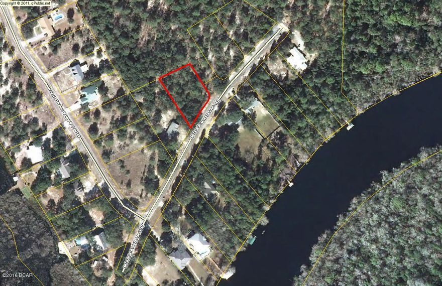 Located on the north side of Choctawhatchee Bay, and just 1.5 miles east of Hwy 331, this lot is only 5-10 minutes away from the Hwy 331 Bridge.  It is nestled among beautiful single family homes and very friendly neighbors. Sitting directly across the street from Black Creek, this lot has several small views of the water.  Visibly high and dry, it is priced to sell.