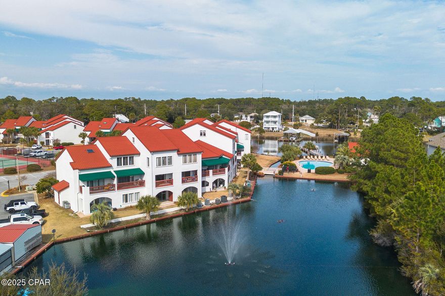 Where coastal ease meets everyday comfort, and gross rental history exceeded $27K for 2025, Villa 504 at The Villas at St. Thomas captures the best of lagoon-front living.

Perfectly positioned on the ground level, this residence allows you to step effortlessly from your screened patio to the water's edge. Life here feels private yet connected, surrounded by resort-style amenities including a sparkling pool off the lagoon, tennis courts, sauna, grilling area, community dock, and dry -boat storage, with on-site dining, entertainment, and the Gulf just moments from your door.

Inside, the one-bedroom plus bunk alcove layout balances function and flow with an open concept design, granite countertops, and a casual breakfast bar that anchors the kitchen. Wood-tone plank and tile flooring add warmth and durability throughout, complemented by an updated bath and in-unit washer and dryer for convenience.

Whether enjoyed as a personal retreat or a smart investment, Villa 504 embodies effortless coastal living -- blending relaxed luxury, thoughtful updates, and unbeatable proximity to the Gulf beaches, local dining, and shopping that define Panama City Beach.