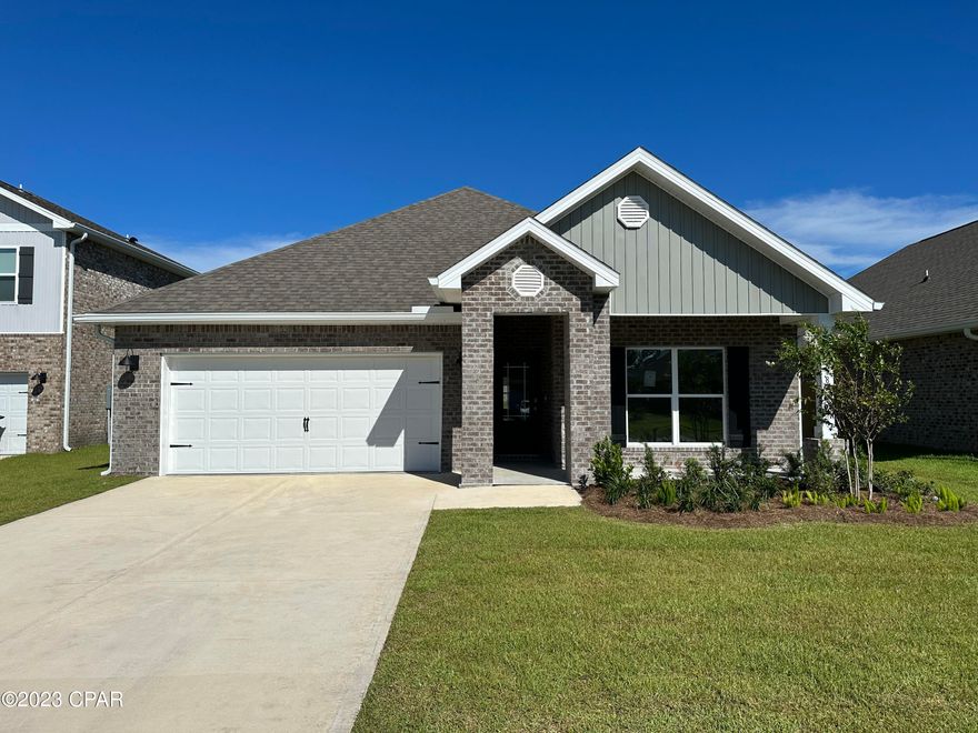 Andrews Park is centrally located off 389 in the very desirable area off Lynn Haven. Our Rhett floorplan is all brick, 4-bedroom 2-bath, it is an open concept floor plan, with a boasting 1,835 sq.ft. The Rhett floorplan has upgraded finishes throughout. You will find 9-foot ceilings with 10-foot trays and beautiful crown molding. The Rhett also has LVP flooring, granite countertops, a large kitchen island with cabinetry on both sides underneath and brushed nickel hardware. This floorplan has energy efficient windows to allow lots of beautiful natural light. The primary bathroom has a beautiful garden tub, perfect for relaxing, and a spacious walk-in shower with a glass enclosure.