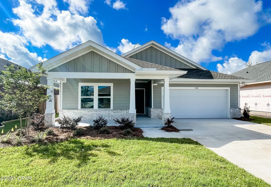 NEW CONSTRUCTION, CAMRYN'S CROSSING II subdivision in Lynn Haven built by Southern Coastal Homes. Interior features if the 4 bedroom home include a large living room that is open to the kitchen and dining area. Kitchen has a large center island, subway tile backsplash, and stainless appliances. French doors lead from the Great room to the large covered patio. Master suite has tray ceiling, double vanity, garden tub, and walk-in closet. This home includes features of the DESIGN BOARD shown in the photos. Cam II offers walking park & playground.

EXTERIOR -2-car garage, large covered porch, covered front porch, fully sodded yard with Rain Bird sprinkler system, & gutters around entire house.