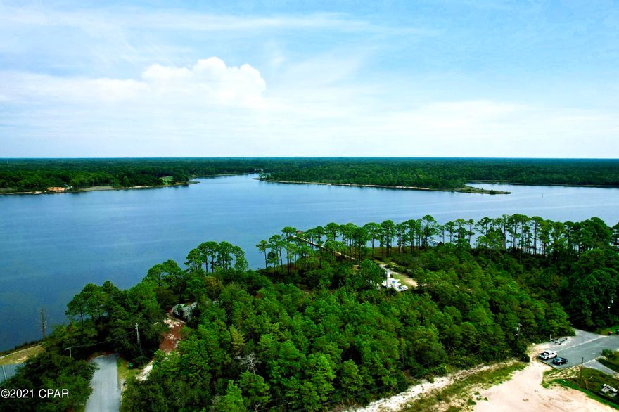CURRENTLY UNDER CONTRACT, SELLER ACCEPTING BACKUP OFFERS! *LOCATION* New appliances, carpet, paint, light fixtures and still touching up a few more things, but don't wait, this beach house won't last long! This 3 bedroom 2 bath home is located on the west end of Panama City Beach. It's is a walk to the beach and Lake Powell. This property is near Pier Park, Carillon Beach and under a 5 minute drive to 30-a. Weekends have endless possibilities for fun! The boat ramp and park are around the corner. The backyard provides plenty of space for family barbecues. The living room has a cozy wood burning fireplace. Schedule a tour today of your future home or rental investment property!
