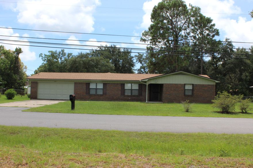 New Roof on this spacious 3 bedroom, 2 bath home with a cozy fireplace for cooler nights and very convenient to TAFB. Some upgrades, new paint but a few odds and ends to be done yet. Take a look today and make it yours!