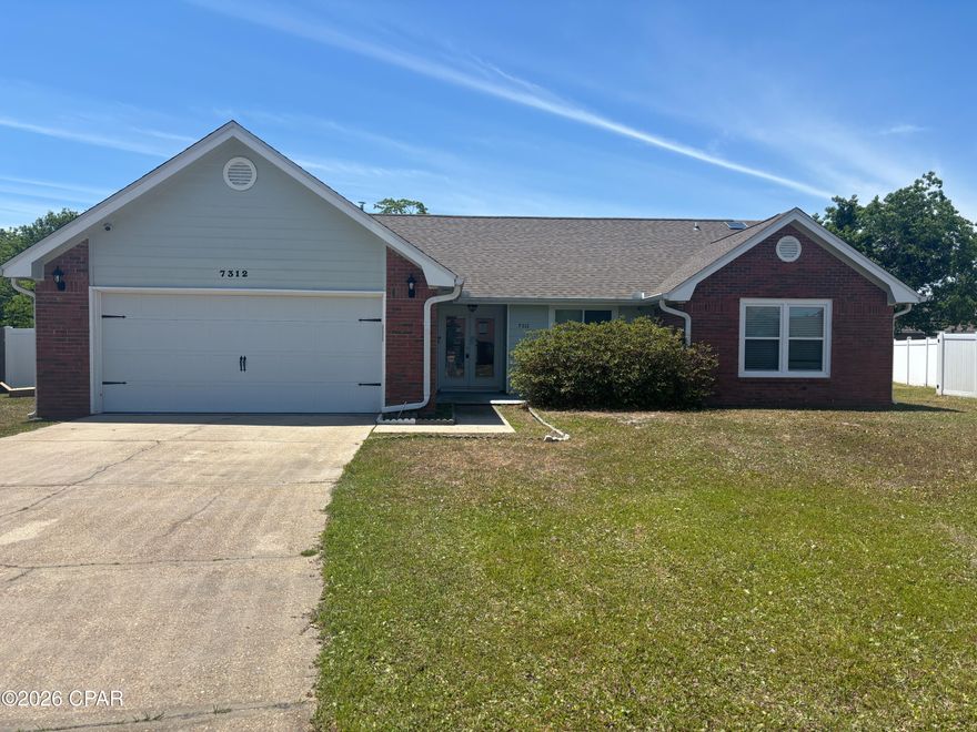In Callaway Point well-maintained 3-bedroom, 2-bath home that affords comfortable living with practical features. The split-bedroom floor plan provides privacy, with a primary suite that includes a sitting area. The kitchen offers a gas stove and adjoins flexible living space ideal for a home office, dining area, or play nook. Tile flows through most of the home while the two additional bedrooms are carpeted. Systems include gas heat and a gas water heater. Outside, enjoy a large screened back porch and a private, fenced backyard, plus a spacious 2-car garage. Located just minutes from Tyndall AFB, this property provides convenient access to nearby shopping and restaurants.