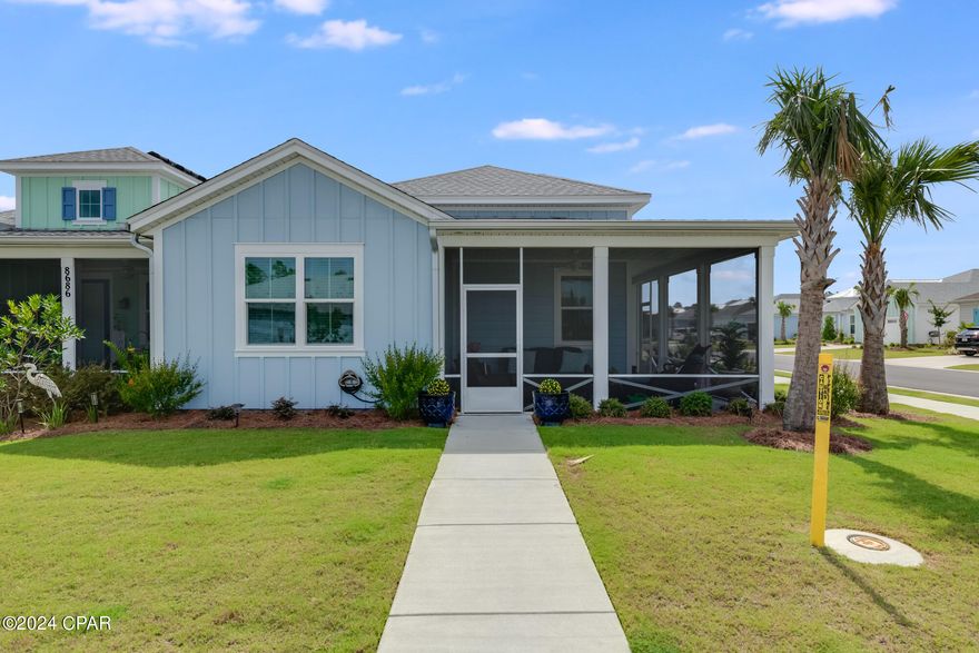 ***CURRENTLY UNDER CONTRACT, SELLER ACCEPTING BACK UP CONTRACTS. OVER $70,000 IN ADDITIONAL UPGRADES*** This 2bd(with den), 2ba with 2 car garage corner lot ''Dreamsicle'' model has no equal!! (LOOK AT ALL OF THE PICTURES). Seller spared no expense in updating this beautiful home. Upgrades/updates include but are not limited to: Glass entry frosted front door, 8 foot interior doors and entryways, wood beamed living room ceiling, diagonally installed tile throughout, quarts countertops, tiled kitchen backsplash, glass shower door, stainless steel appliances, soft close cabinetry, LED lighting throughout home, remote controlled ceiling fans, shiplapped walls, epoxy floors in both garage and screened porch, insulated and reinforced garage door, gutters, master bedroom wall safe, and custom lights over kitchen island. Latitudes Margaritaville amenities include the Bar and Chill Restaurant(3 bars), oasis outdoor pool and indoor heated lap pool and whirlpool,  pickleball and tennis courts throughout, outdoor pool table, ping pong table, putting green, mini golf, walking trails throughout, bocce ball,  cornhole, state of the art ''Fins Up'' fitness center, and daily music by the pool. And don't forget the future Marina!!! Bring your golf cart and join this fun filled and engaging community!!! All information is approximate and should be verified by buyers if important