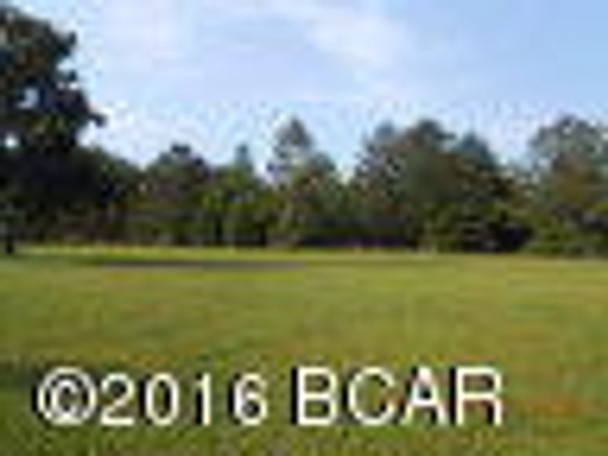 Reduced $10,000.Must Sell! 2.87 acres of Improved Commercial or Residential land. located at the entrance of Dogwood Lakes Golf Club. land is mostly open with a little section of woods. Property has two septic tanks, electric , community water and a gorgeous huge oak tree. There are many uses for this nice property. Can be used for commercial purposes or for your new home. Nice pond on back of property. land is three attached properties. Use two for your house and Field, use the other for your Commercial Business.