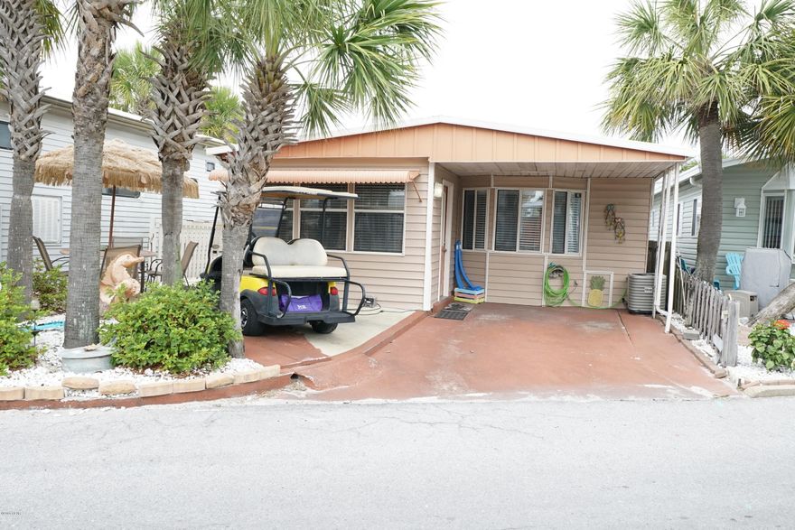 Check out this 2 bedroom 2 bath Venture Out super cute home! Wonderful location within the resort. Great potential here for investment or 2nd home. Venture Out has 300' on the beautiful pristine beaches of the Gulf of Mexico and 1,000' on the Grand Lagoon. Venture Out has something for everyone. With two salt water pools (one heated), fishing pier, boat ramp, mini golf, children's play ground and much more.
