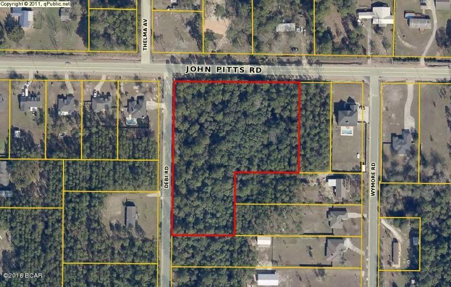 Huge 3 1/2 acre corner parcel in excellent location. Conveniently located off HWY 231 for that easy commute to Panama City. Area of very nice homes. Great place to build your country estate and still enjoy the city life. If you need a bit more room to spread out, adjoining 6/10 acre lot is available for $18000.
