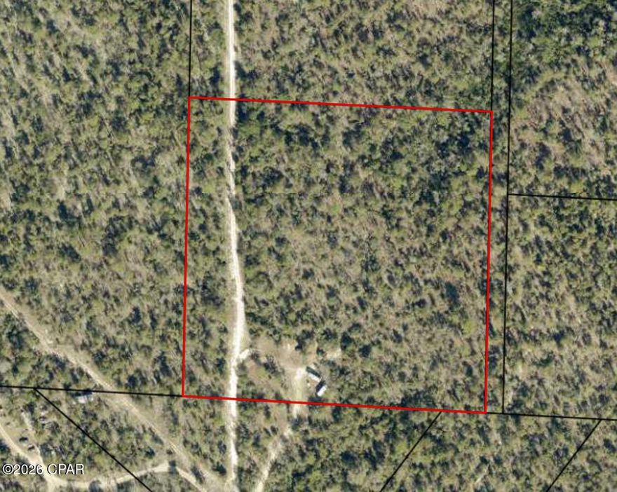 Almost 10 acres of privacy in Fountain, Florida, tucked away in the woods. This peaceful property offers plenty of space to enjoy nature, build your dream home, or create a private getaway. Surrounded by trees and natural beauty, the land provides a quiet setting while still being within driving distance of nearby towns, shopping, and outdoor recreation. Electricity is close by for easy access, and the property will need a septic system and survey. A great opportunity for anyone looking for space, seclusion, and the charm of rural Florida living. Make an offer and combine with MLS 786601 4.82 acres north of this property