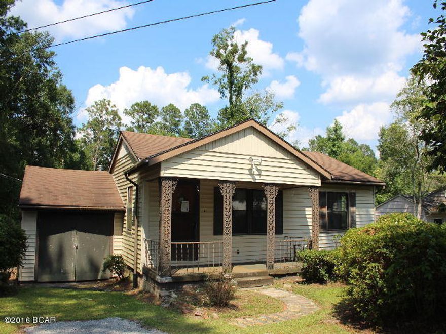 ** PRICE REDUCTION ** Cottage style home in town on nice lot with pretty back yard. Home has 3 bedrooms and two baths. Downstairs you have a large den that overlooks the back yard. There is an enclosed workshop in what was a one car attached garage at one time. This would make a perfect home for the retirees or a great investment property! Don't wait, make appointment to view this one today!!