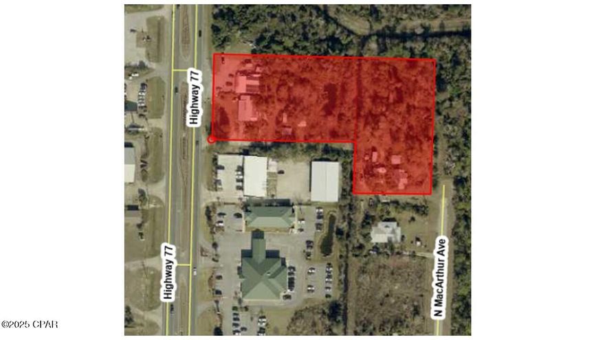 Approximately 230 feet of frontage on Highway 77 with a depth of about 535 feet along this major four-lane roadway. The area sees daily traffic counts of 28,500 vehicles per day. High growth area with multiple businesses and development opportunities.