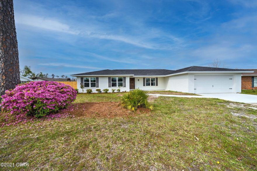 Be the ''Belle of Belaire Estates'' in this gorgeous one-level beauty with 4 bedrooms, 2.5 baths, an expansive living room, a separate den with wood-burning fireplace which opens to the kitchen, a double garage, and a  fenced-in yard.  Newer features include the roof, the HVAC, shutters, kitchen cabinets and countertops, stainless appliances, new light fixtures, new interior doors, new extra wind rated garage door with opener,  and fresh interior and exterior paint. The new windows and sliding exterior door have been installed as of late March.   Superb location. Don't wait until it is too late! Make this ''like-new house''... your  NEW home!