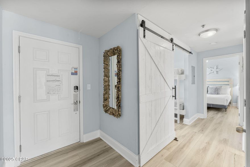 Big Price Drop! This beautifully updated 2-bedroom, 2-bath condo with a bonus bunk area at Laketown Wharf offers the ultimate coastal escape. Perched on the 6th floor, the unit showcases sweeping Gulf views from the primary suite, kitchen, and living area, while the guest bedroom overlooks the serene lake and nightly fountain show. Inside, you'll find recent upgrades including new flooring, refinished cabinets, updated appliances, a custom barn door, and fresh coastal décor—all sold fully furnished and rental-ready. The open layout makes it perfect for gathering, relaxing, or entertaining, while the private balcony delivers postcard-worthy sunsets. Convenient walkover access from the North garage means you can skip the elevator wait and get straight to enjoying your stay. At Laketown Wharf, resort-style amenities abound: five sparkling pools, hot tubs, a modern fitness center, on-site dining, shopping, and the signature boardwalk along the lake. Beyond the resort, you're steps away from Pineapple Willy's, Ripley's Believe It or Not, WonderWorks, Signal Hill Golf Course, and plenty of dining, nightlife, and family attractions. And of course, the beach is just across the street. Whether you're looking for a vacation home, short-term rental investment, or full-time residence, this turnkey condo checks every box. Schedule your showing today and take advantage of this incredible value while it lasts!