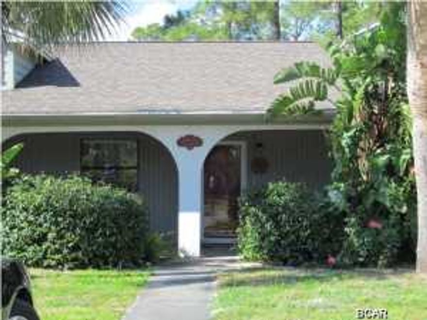 Canal front 1 Bedroom, 1 Bath all tile unit in gated Harbour Towne, includes washer/dryer, garbage, lawn service and basic cable.