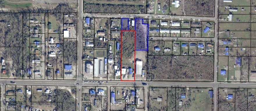 Current tackle shop in operation in the main building and a beauty shop in the small building. The tackle shop is under lease until end of 2020  and the beauty shop is month by month. Two additional vacant parcels come with the sale of thew property. It brings total to 2.7 acres. Excellent investment opportunity for the dollar amount. The two additional lots front on 4th st.
