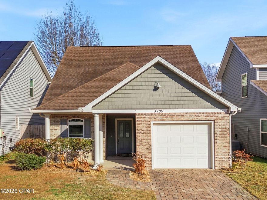 Spacious 5-bedroom, 3-bath single-family home ideally located just off North Lagoon Drive in Panama City Beach. This well-designed home features an open-concept living plan with a kitchen that overlooks the main living area—perfect for entertaining and everyday living. One bedroom and full bath are conveniently located downstairs, while the remaining four bedrooms are situated upstairs for added privacy. Additional highlights include a single-car garage and a fenced backyard. Enjoy access to the community pool, available to both owners and tenants.