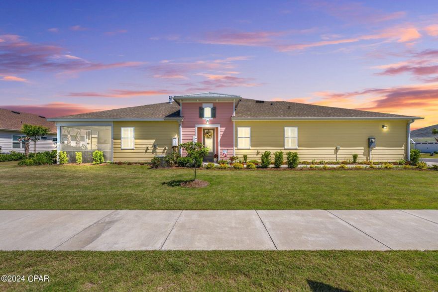 CURRENTLY UNDER CONTRACT, SELLER WILL CONSIDER BACKUP OFFERS. This meticulously maintained Antigua villa in the 55+ community of Latitude Margaritaville Watersound boasts an impressive oversized corner lot with eye-catching curb appeal. The personalized landscaping further enhances the villa's attractiveness, creating a welcoming ambiance. Step inside to discover beautiful Sandcastle Oak Laminate and tile flooring throughout, complemented by an abundance of upgrades. The custom built-in cabinets in the dining room, sleek white cabinetry with crown molding and under-cabinet lighting in the kitchen, and stunning L4 Quartz countertops all add a touch of elegance and sophistication. The spacious kitchen features stainless steel appliances with a double oven and a gray island cabinets accented with decorative panels. The well-organized pantry boasts custom shelving, maximizing space and functionality. Plantation shutters provide privacy and style throughout the home, while custom remote blinds on the front glass door and the three expansive lanai sliders offer added convenience. The luxurious master bathroom showcases a seamless shower and a custom built-in closet system, making relaxation and organization a breeze. Whether you prefer cozying up by the fireplace (with a heat blower) or enjoying the outdoors on the screened-in lanai, this villa offers the perfect spaces for both relaxation and entertainment. Some furniture and the washer & dryer may be negotiable, and the Golf Cart will be included with a full-price offer! Latitude Margaritaville is the premier 55+ community, renowned for its unmatched amenities. Residents enjoy exclusive access to a private restaurant with multiple bars, a resort-style pool, live music performances, pickleball, bocce ball, cornhole, a putting green, a state-of-the-art fitness center, an indoor lap pool & whirlpool, and a dedicated lifestyle staff committed to creating an active and fulfilling community experience. Phase 2 of the amenities promises even more exciting additions, including additional pickleball courts, a full-size theatre, Barkaritaville dog spa, woodworking shop, pottery room, business center, and community rooms for clubs, groups, wine, liquor, and beer tastings, and food demonstrations. The public retail area is also expanding, with the golf cart store already in operation. Capital City Bank has broken ground, and the highly anticipated grocery store, restaurants, and boutique shopping are coming soon. Additionally, a public marina is planned, offering convenient access to the beautiful surrounding waterways.