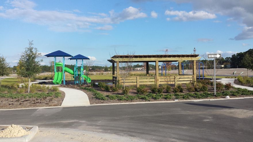 This home features the St. George floor plan with Coastal Elevation.This house is a new construction Model Home Example and not the actual house being built. Samuel Taylor homes are truly one of the best constructed homes in Bay County. We build our homes with 2x6 exterior studs vs other builders using 2x4's. Not only is it a stronger home, but this also allows us to put R-19 in the walls instead of R-13.  We also use R-38 in our ceilings vs R-30 like most builders. We insulate most of the interior walls to make a very quiet home. SS appliance package is standard along with brushed nickel faucets, security system, 8 ft. doors throughout, granite counters in kitchen and baths, raised vanities with under mounted porcelain sinks, SS gas oven, oversized tiles, upgraded carpet with 8lb padding and much more.
   A craftsman style trim package adds to the character and uniqueness of our homes. Choose from 3 exterior elevations: Classic, Coastal, or Boat builder. Pick from traditional style garages or our detached garages with optional carriage home above, perfect for the college student, guests or in-law quarters.
   SweetBay offers biking and hiking trails, a boathouse to launch canoes, kayaks and paddle boards, a permitted marina, community pool (construction to start 2016), several parks, ponds, children's playground, planned township with a major grocery store and many shoppes. Everything is within a 5 minute walk or less.  University Academy is the center of this beautiful community. The Academy is the #1 school for math and reading for the Bay County District. Your children are automatically enrolled with purchase of a home. Currently there are over 800 on the waiting list to get in to the school. Come see what everyone is talking about!