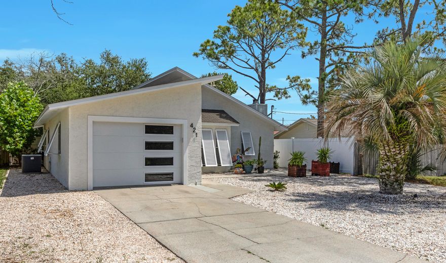 New roof installed June 2020! Walk to the beach or favorite local restaurants in this golf cart friendly community. Fully Updated and remodeled with screened porch and private back yard. This beach house is one of the coolest you will ever see. 2BD/ 2BA home just two blocks from the beach in the quiet Open Sands neighborhood. The home features new granite countertops in the kitchen and bathrooms as well as stainless steel appliances. Irrigation, trim, doors, and interior and exterior paint. New hot water heater and garage door in 2019. A new roof will be installed before closing as well! No HOA fees and no short term rentals are allowed in this area.
