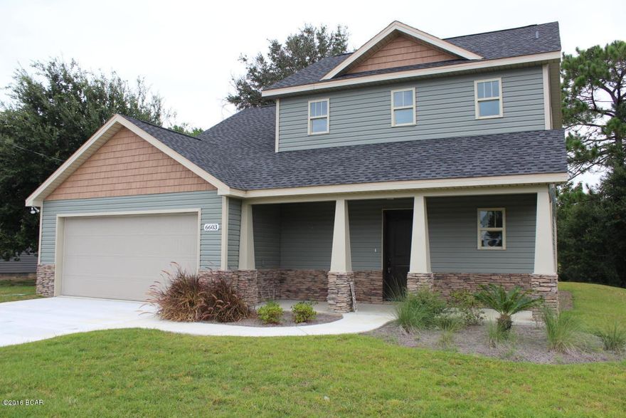 You must see this newly constructed three bedroom, two and a half bath home located directly on Fox Lake, convenient to Tyndall Air Force Base. The home will save money with its energy efficient ''Low E'' windows, and R-30 insulation in the ceiling. The layout feels airy with the bright open spaces. You'll be amazed that it Features include upgraded 18'' ceramic tile, stainless steel Whirlpool appliances, espresso stained custom cabinetry, crown molding, oversized garage, a convenient half bath downstairs and laundry room just off the kitchen for easy access. Bedrooms are all upstairs, offering a quiet retreat