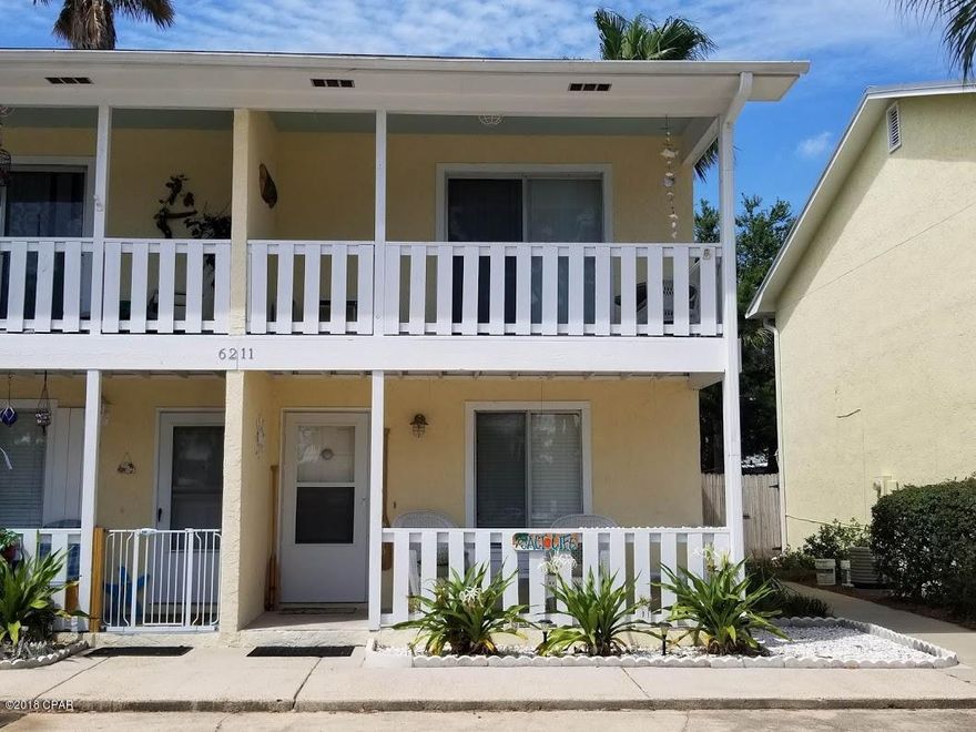 Spacious townhome located on South Lagoon across the street from the Lagoon with a lagoon view. Downstairs you have an open floor plan with a large great room. The back yard is fenced in with a nice patio and a storage building that is wired.  Up stairs you have 2 large bedrooms and a full bath. This townhome is in a great location close to a boat launch, close to the beach and close to restaurants and shopping.  Make an appointment to see this great home today!