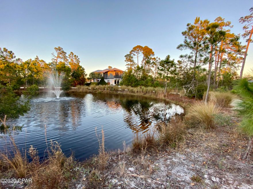 PRICE REDUCED TO $62K! PRIME HOME SITE OVERLOOKING A PRETTY LAKE IN MARTINIQUE LESS THAN A MILE FROM THE BEACH WITH WONDERFUL AMENITIES & LOW HOA FEE!  Enjoy the convenience of dining at several popular restaurants including Grand Marlin and the famed Captain Andersons and two full-service Marinas to keep your boat  or  charter an adventure...all walkable and just minutes away!  The popular St Andrews Park and our 'world class' beach is located less than a mile from this site!



Here's a rare opportunity to secure a prime, home site  in  Martinique, a gated enclave of upscale homes just off Thomas Drive and Grand Lagoon. It is nestled amongst tall oaks,pines and lush landscaping. This intimate, golf-cart friendly community offers scenic lakes with fountains, lighted streets,  a lovely walking trail throughout the community, a resort style pool and park pavilion overlooking the main lake, a basketball court and playground.  It is located close to good schools, great shopping and area attractions.  It is 'short term rental restricted' making it the perfect place to build a family home that allows you to enjoy the luxury of nearby conveniences but provides a quiet, tranquil neighborhood.
This site measures 50' x 125' and offers good elevation. There are numerous homes currently under construction. Martinique has good HOA restrictions, NO Build-out time and is in a safe X Zone for flood insurance. This is the perfect site for a permanent or 2nd home or investment for future appreciation.