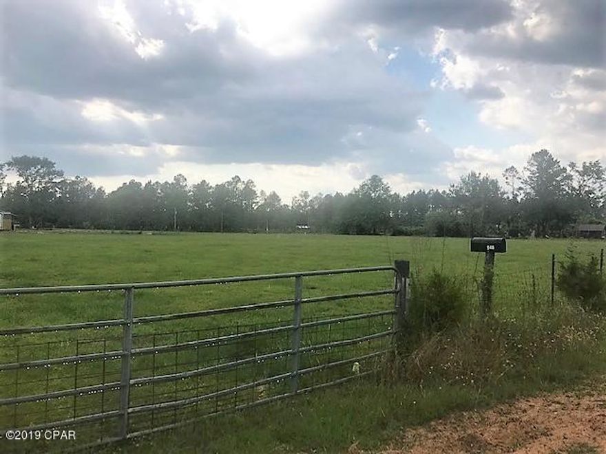 CURRENTLY UNDER CONTRACT, SELLER ACCEPTING BACKUP OFFERS!  Almost 2 completely fenced and cleared acres are just waiting for you to build your home.  This beautiful home site is located in the country and already has a 911 address.  Seller is in the process of having a well, septic and electric installed. To make it even more appealing, it is very close to the state park and is only minutes from shopping and restaurants.