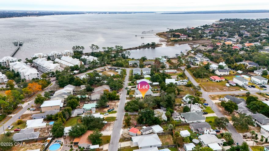 Buildable Double Lot - Steps to the Water!

Opportunity knocks... and this one is loud. Just one block off the water, this oversized double lot offers flexibility that's almost impossible to find in this part of Panama City Beach. Build two homes for maximum investment potential, or spread out and create one custom coastal dream home with room for everything you've ever pictured.

Located just down the road from The Preserve on the Bay and Bay Point, you'll enjoy the convenience of premier neighborhoods—without the HOA fees. That's right... freedom to build what you want, how you want it.

A two-story home on this property can capture peek-a-boo water views from the upper level, giving you that daily ''pinch-me'' moment. Even better, the lot sits in Flood Zone X, meaning no flood insurance requirement—a rare win this close to the coast.

Whether you're a builder, investor, or someone ready to design your forever beach retreat, this location simply can't be beat.