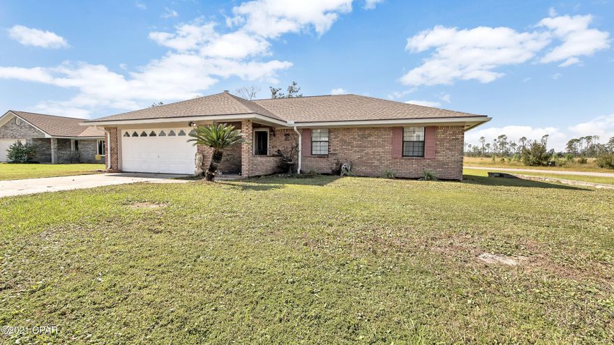 CURRENTLY UNDER CONTRACT, SELLER ACCEPTING BACKUP OFFERS  - - -  This all brick home sits on a great corner lot in Grimes Callaway Bayou Estates, only 8 miles from Tyndall Air Force Base. The living room has vaulted ceilings with beautiful beams framed with a brick fireplace. All new stainless steel appliances in the kitchen and beautiful Luxury Vinyl Plank floors throughout the home. This 3 bedroom home offers great bedroom sizes with a total of 1,700 sqft. of living space. HVAC is 3 years old and the water heater is brand new. HOME IS PRICED ACCORDINGLY - UPDATES NEEDED IN THE KITCHEN AND BATHROOM AREAS. Great yard size for your family's needs and entertaining. This home qualifies for 100% USDA financing  -Please note that this home is occupied, Please call an agent to make an appoi
