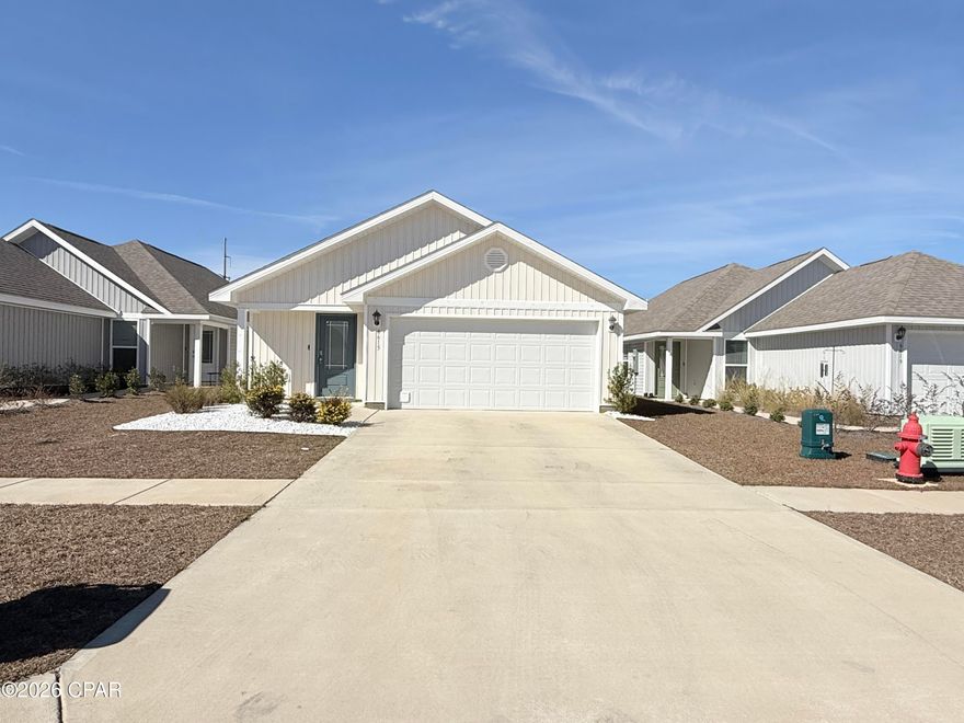 Charming 3-bedroom, 2-bath home with an open floorplan connecting the living, dining, and kitchen areas. The kitchen features a center island, white cabinetry, and stainless-steel appliances. Vinyl flooring in main areas, carpet in bedrooms, and durable laminate countertops throughout.

Located in the sought-after Liberty community, close to Tyndall AFB, hospitals, shopping, and dining. Residents enjoy a community center with gym, resort-style pool, splash pads, and outdoor grilling area.

A modern, comfortable home with plenty of amenities at your doorstep.

Schedule your tour now!