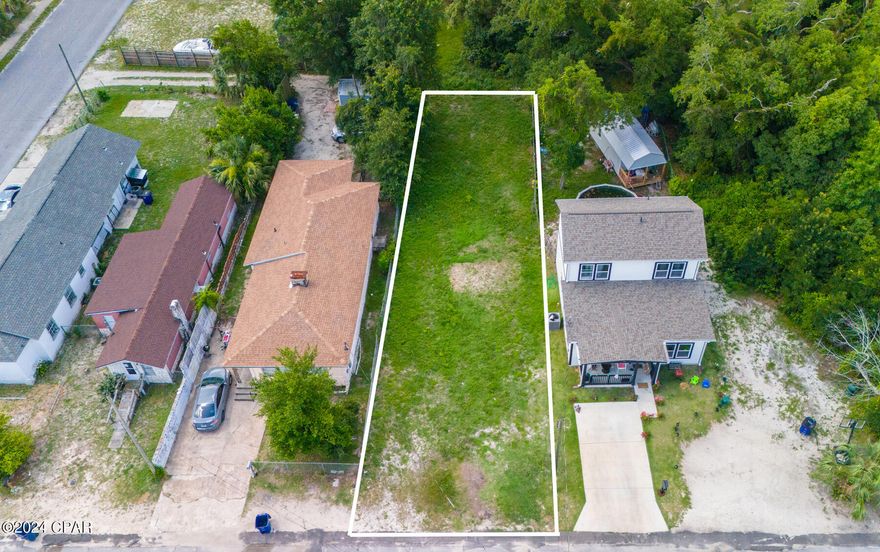 Zoned as MU 1; ready for your dream home or investment property. This versatile property is perfect for a single-family home or a multifamily building, offering you plenty of possibilities to create the perfect living space. With all utilities available, you can enjoy a hassle-free building process, and with the lot already cleared, you can start building right away. This property provides a fantastic opportunity to build in a prime location, and the Mixed Use 1 zoning. Whether you're looking to build a home for your family or an investment property, this lot provides the perfect foundation for your vision. Don't miss out on the chance to make your dreams a reality and take advantage of this fantastic opportunity today!