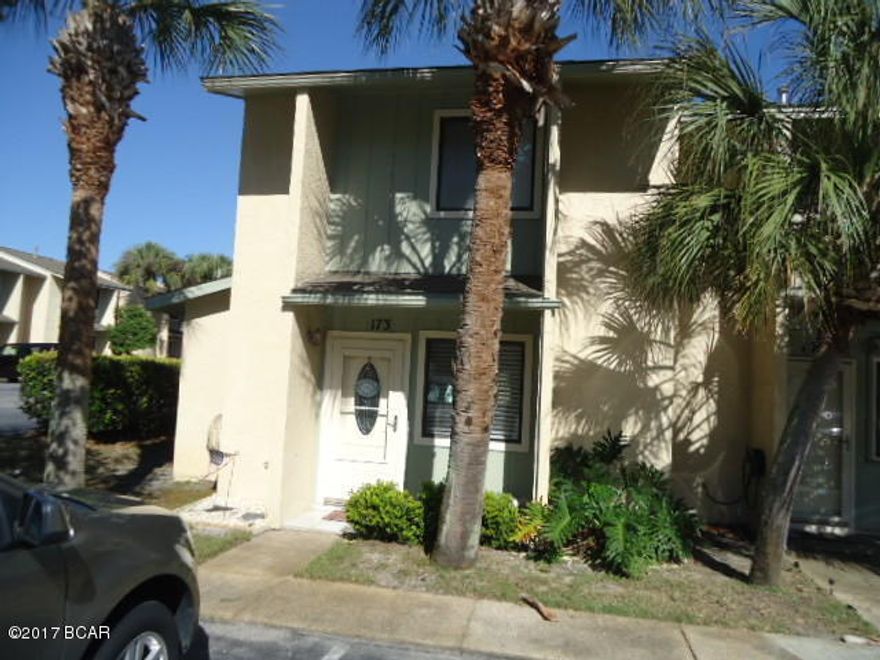 Age, SF, and dimensions approximate. Beautiful end unit. Downstairs redone in 2013. New cabinets, granite counter tops, and appliances. Newer vanities in bathrooms with granite counters. You need to see this one. Outside storage on the side of unit. Hurry on this one. It won't last. Complex has 11 pools to include clubhouse with pool on the beach. Gated community and pet friendly.