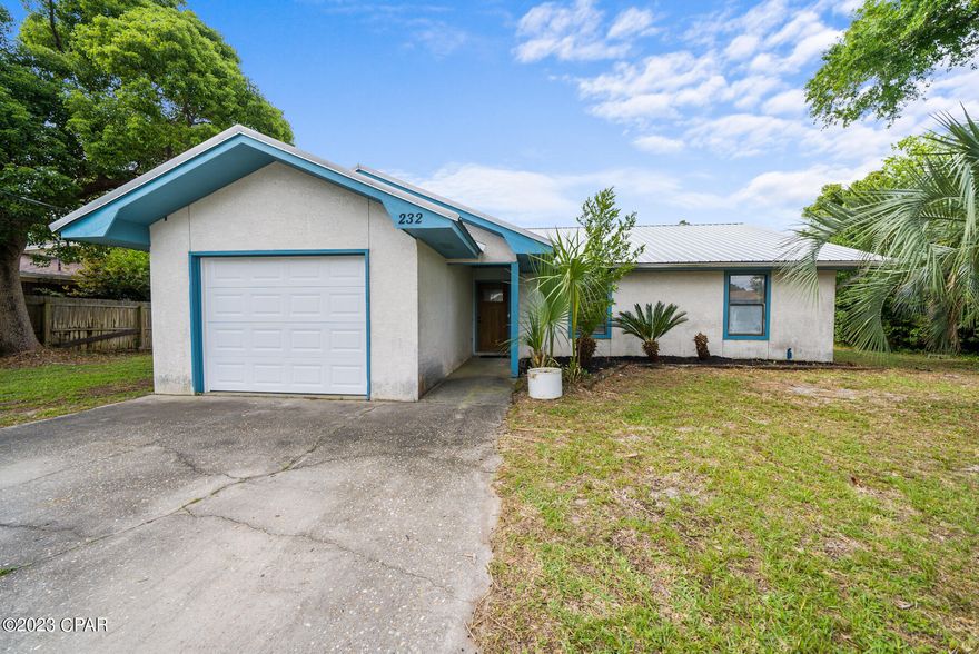 Come see this beautiful home in North Lagoon Heights! A Short drive away from Navy Base,Thomas Drive, St. Andrews State Park, Boat Ramp and Gulf of Mexico. An Appealing 3-bedroom 2-bathroom single story house with all new flooring in bathrooms and bedrooms, new garage door, new light fixtures, stainless steel appliances and all new interior paint. Outside you have a nice size yard with a utility shed included, perfect for storage! Garage has been partially converted to a laundry room area. Inside you have the master bedroom with a walk in closet and another closet as well, along with adjoining master bath with double vanity. Also vaulted ceiling in living room with wooden beam. Washer and dryer to remain. Located off North Lagoon, a quiet community. Visit today!!