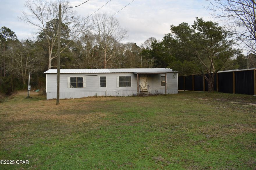 This is a great opportunity for a FYI project!!!!!!! 
There is a 1288 SQ FT DWMH that needs some TLC to get it ready to be you next home or rental. 
Located in the city limits of Chipley this parcel is in close proximity to shopping, restaurants, Hospital/Dr Offices, schools, and Churches.