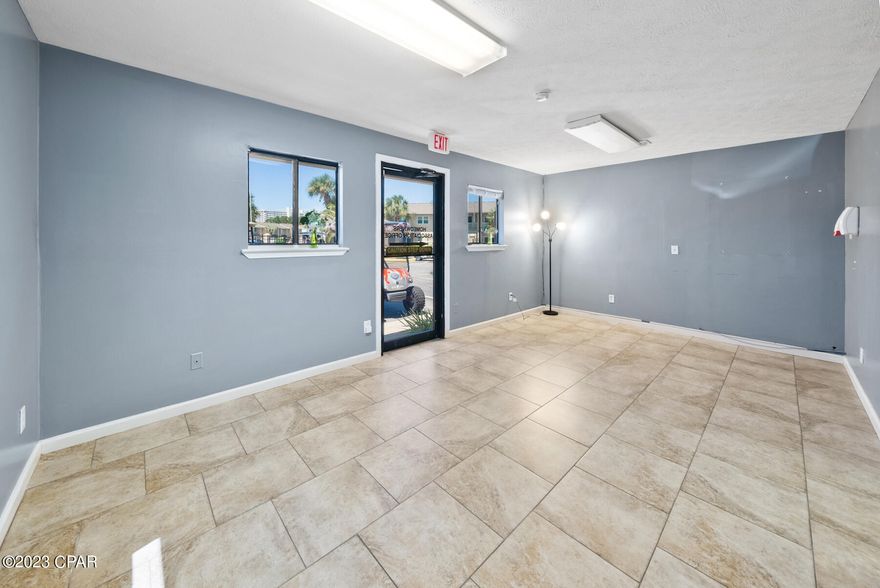 Office suite located perfectly on Hutchison Blvd near R Jackson offering ease of access from Front Beach and Back Beach at Gulf Highlands. Rent includes all utilities, insurance and taxes. This suite is subdivided into 3 equal rooms. Entry can be a reception room, waiting, etc.  There is a middle room and a ''back office'' space with a restroom. Each space already has doors. This could be a small business where you can welcome people in, have a work space  and office space. Your imagination is the limit. Let's discuss the options for what you need!