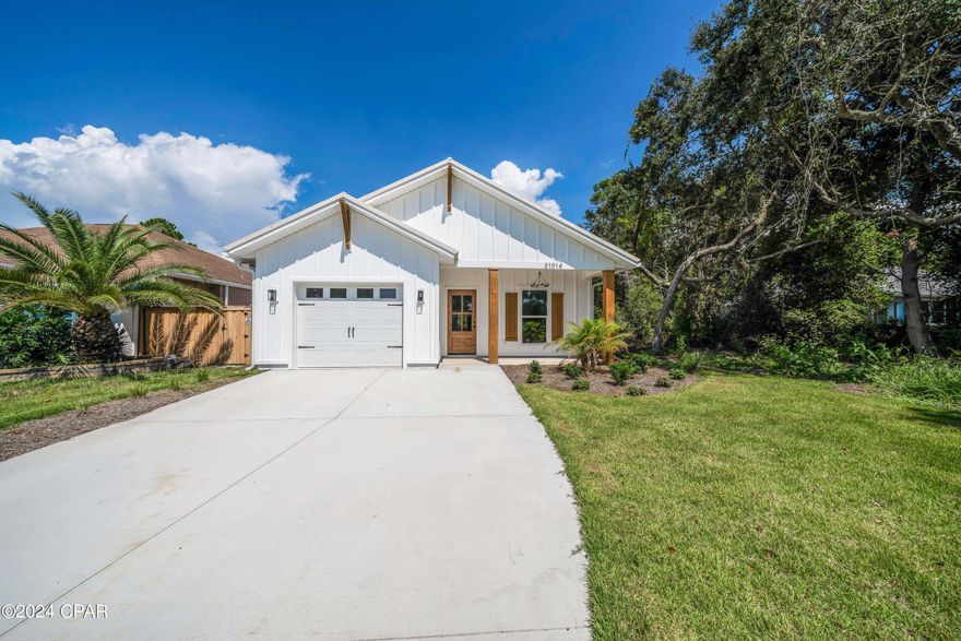 BRAND NEW CONSTRUCTION!!! This 3 bedroom 2 bathroom home is located in the beautiful west end of the beach just half a mile from the ocean, in a golf cart community. Featuring an open concept living space for smooth transition from room to room and to the outdoors. Enjoy the Quartz countertops throughout, White shaker soft close cabinets, tile backsplash, double vanities in the Master bath with an oversized custom floor-to-ceiling tile shower and large walk in closet. Equipped with beautiful Stainless steel appliances, Kitchen Island, luxury vinyl plank flooring, 9ft ceilings throughout, out door shower, 1-car garage, irrigation, and two covered porches to give you plenty of space.